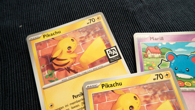 Tangerang, Indonesia on 17 October 2026: Pokemon Promotion Card from Gyu-kaku Japanese Restaurant Indonesia. Pikachu and Marill Pok&eacute;mon TCG promotion cards from Gyu-kaku Japanese Restaurant Indonesia