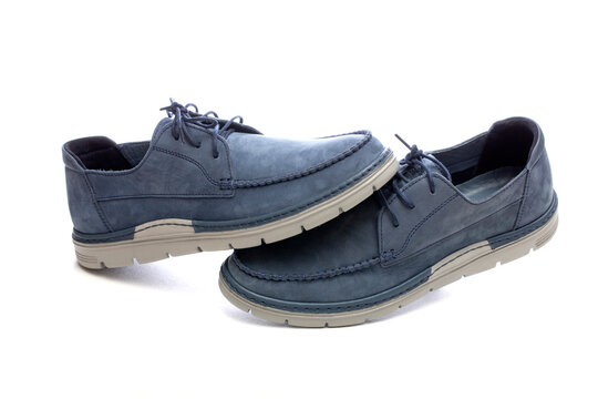 Blue men's lace-up shoes on a white background