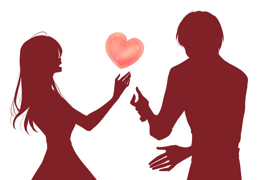 手を差し出す男女とハート型　恋愛　シルエット