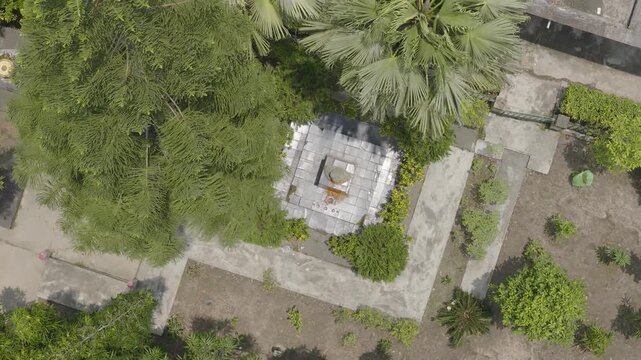Top View Aerial Drone Photography of Urban Road, Green Garden, Moving Vehicles and Rooftop Solar Panels