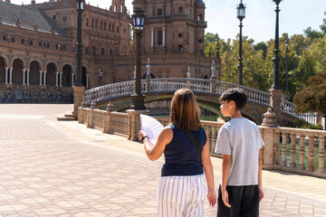 Tourists exploring plaza de españa in seville spain © amfer75