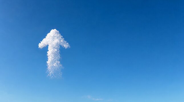 Natural cloud shaped like an upward arrow in clear blue sky, metaphor for progress and success.