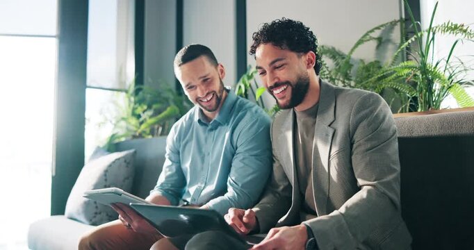 Tech, men and fist bump in office for teamwork, funding approval and project success with happiness. Laptop, tablet and achievement with people in corporate lounge, financial target and good news