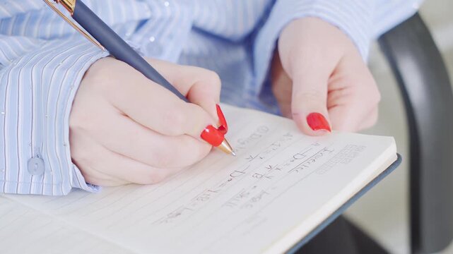 Businesswoman or programmer writing report coding at office. Leadership development remote work taking note digital logic code. Teacher education learning cybersecurity. Close up hand write on book