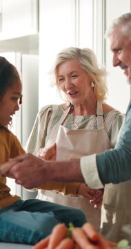 Happy, grandparents and dancing with child, kitchen and laughing with grandson in home on weekend. Senior people, smile and celebration with boy, interracial and rhythm with family or fun in house
