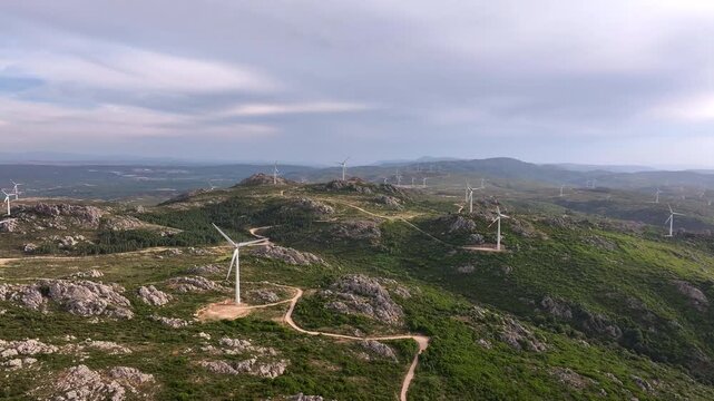 Aerial view of wind turbines on mountain landscape in Sardinia, Italy