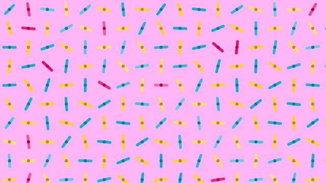 Bright pink backdrop filled with randomly scattered small multicolored dashes and dots