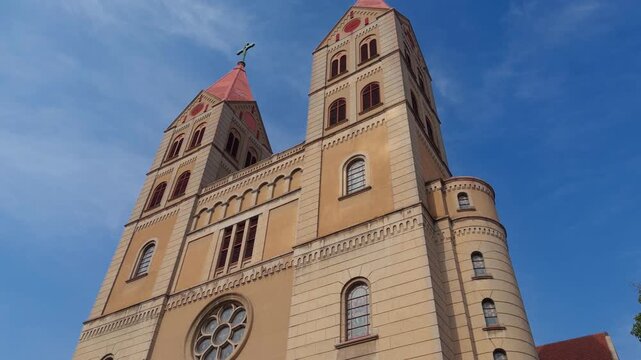 Qingdao St Michael Cathedral Gothic Facade Handheld Slow Tilt Down