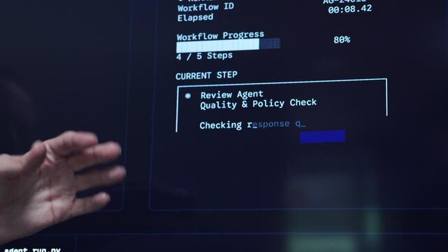 A hand points at a computer screen displaying an AI agent workflow dashboard with status updates for planner, research, analysis, review, and final agents during automated task processing.