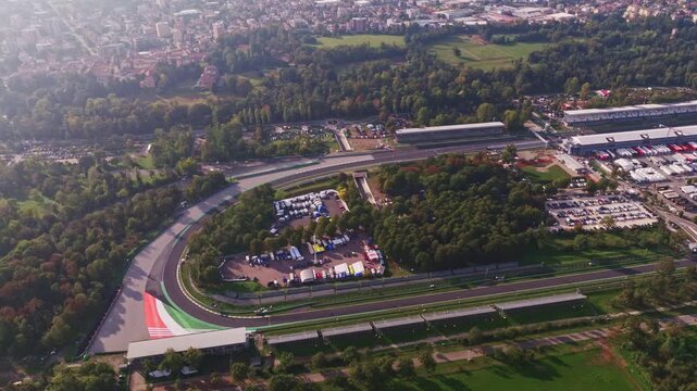 Aerial drone view of Autodromo Nazionale Monza in Monza, Italy, showcasing the iconic Formula 1 racing circuit, racetrack, grandstands, and surrounding parkland.