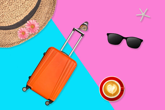 Summer Vacation Travel Essentials Flat Lay On Pink And Blue