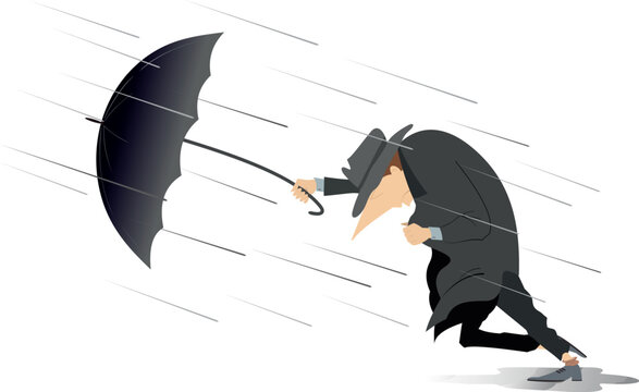 Extreme weather. 
Man with umbrella trying to walk against the strong wind
