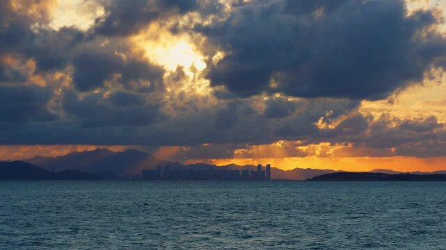 Qingdao Sunset Tyndall Effect City Skyline Across Sea Handheld Cinematic