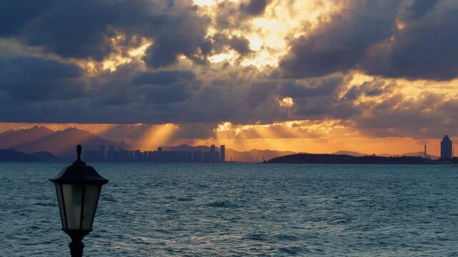Qingdao Sunset City Skyline Tyndall Effect Street Lamp Foreground Cinematic