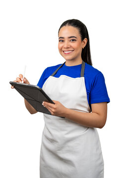 Smiling latina woman wearing an apron and blue shirt using a digital tablet with a stylus