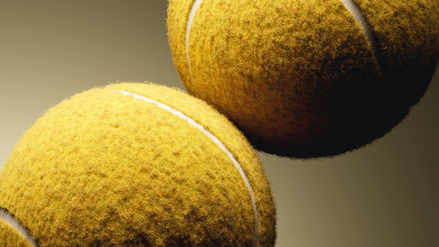 Close-up of two worn tennis balls showing fuzzy yellow felt, white seam stitching, and shallow depth of field under soft directional light on muted beige background for sports training