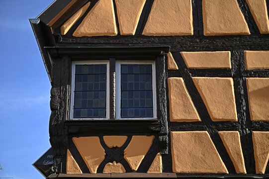 Landscape with scenic view of an antique Alsatian half-timbered house in Turckheim, Alsace France.