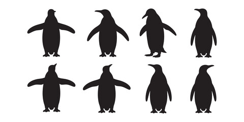 Set of black penguin silhouettes in different poses © MILON ROY