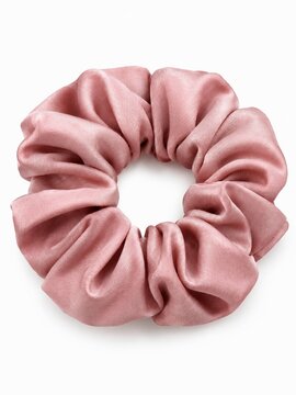 Pink Satin Silk Scrunchie Hair Tie Isolated On White Background