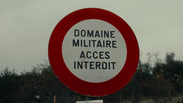 French military area access prohibited sign with a red border