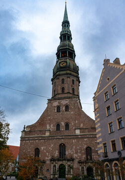 The distinctive green copper spire and clock tower of St. Peter's Church in Riga Latvia