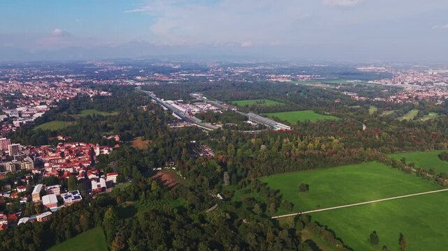 Aerial drone view of Autodromo Nazionale Monza in Monza, Italy, showcasing the iconic Formula 1 racing circuit, racetrack, grandstands, and surrounding parkland.