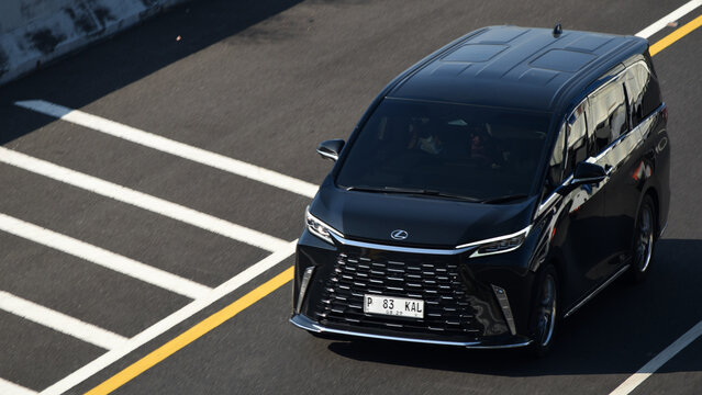 High angle shot of a black Lexus LM 350h