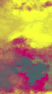 Vibrant abstract sky background featuring colorful glowing clouds and atmospheric texture.