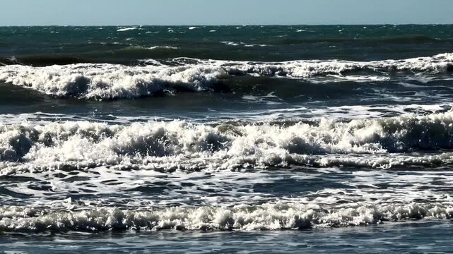 Powerful Ocean Waves Crashing With White Foam And Spray During Stormy Weather