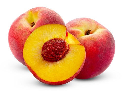Two peaches and peach half with pit isolated. Juicy red peach and cut in slice of pech isolate on white background.