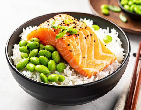 Rice with fresh salmon and lima beans, black bowl. AI
