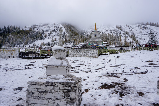 Tibetan Buddhist Stupas in Snow at Mount Siguniang, Sichuan, China