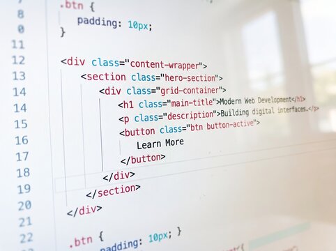 Abstract HTML and CSS Programming Code on Bright Computer Monitor, Close Up Web Development and Software Engineering Background