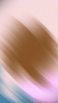 Abstract motion blur background with soft pastel brown and pink tones.