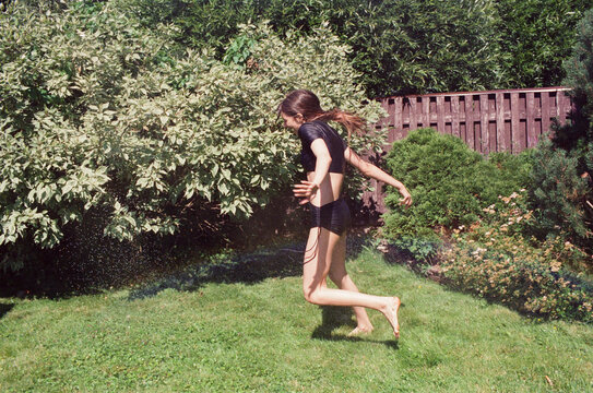 A teenage girl is happy about the summer activities