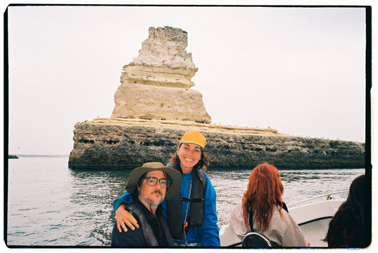 Tourists by Sea Stack Portrait