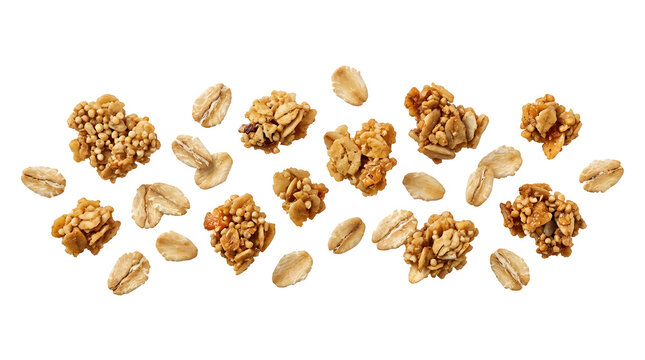 Delicious crunchy granola clusters and rolled oats flying falling on transparent background