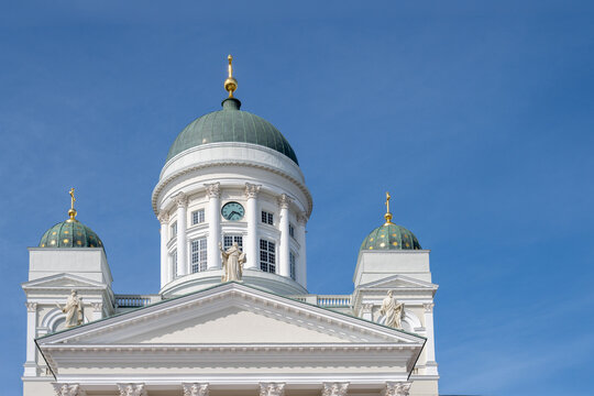 Dome and statues of Helsinki Cathedral under a clear sky in Helsinki, Helsinki, Finland