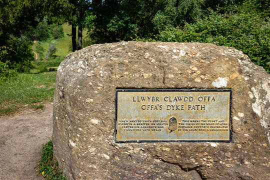 Stone monument marker indicating the start point of Offa's Dyke Path set in green countryside at Sedbury Cliffs Gloucestershire