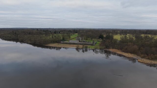 Aerial view along the wooded shoreline of Lough Neagh near Shane's Castle on an overcast winter morning, Northern Ireland