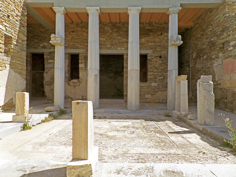 Reconstructed marble columns of the ancient House of Dionysus courtyard on Delos Island, Mykonos, Greece