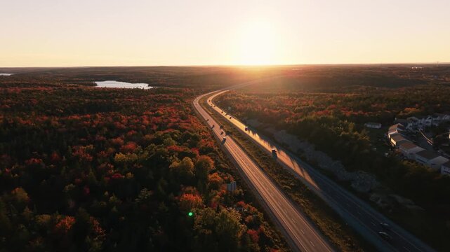 Golden autumn light sweeps across a nova scotia highway and solar panels in canada