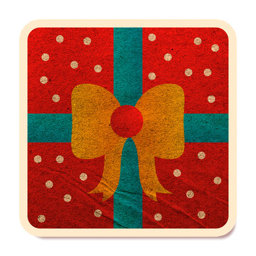 Vintage style Christmas gift box icon with red paper and yellow bow