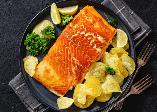 Norwegian smoked salmon portion with potato chips