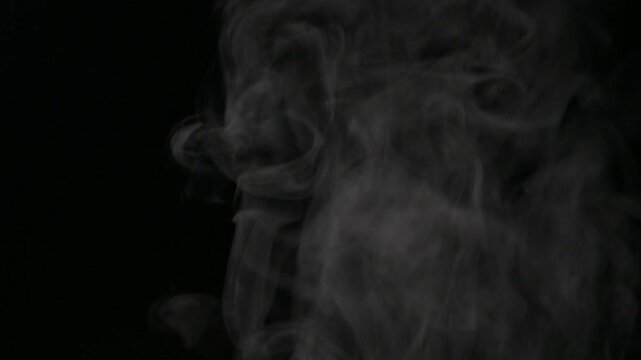 Dense white cooking steam rising and swirling naturally from a pot, isolated on a transparent background. Alpha channel overlay for food videos, cooking scenes, and cinematic visual effects.