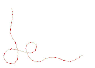 White and red Christmas wrapping rope in a corner arrangement isolated on white or transparent background © Ortis