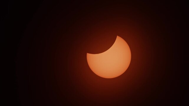 Moon's shadow slowly crosses the sun during the 2026 solar eclipse over Nova Scotia, Canada