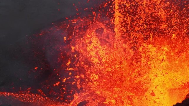Active Volcanic Crater Erupting Molten Lava Fountain with Smoke and Ash Cloud Field