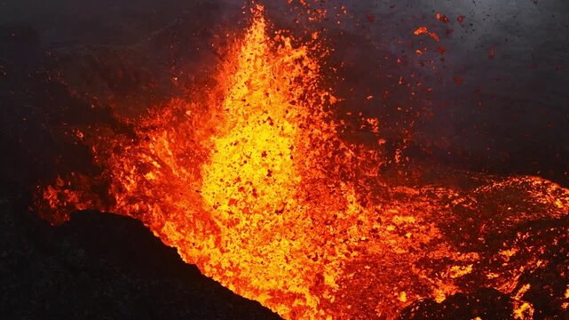 Active Volcanic Crater Erupting Molten Lava Fountain with Smoke and Ash Cloud Field