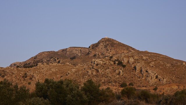 Barren hill with rocky surface under clear blue sky in a dry landscape, Amari Basin, Amari, Central Crete, Greek Islands, Greece